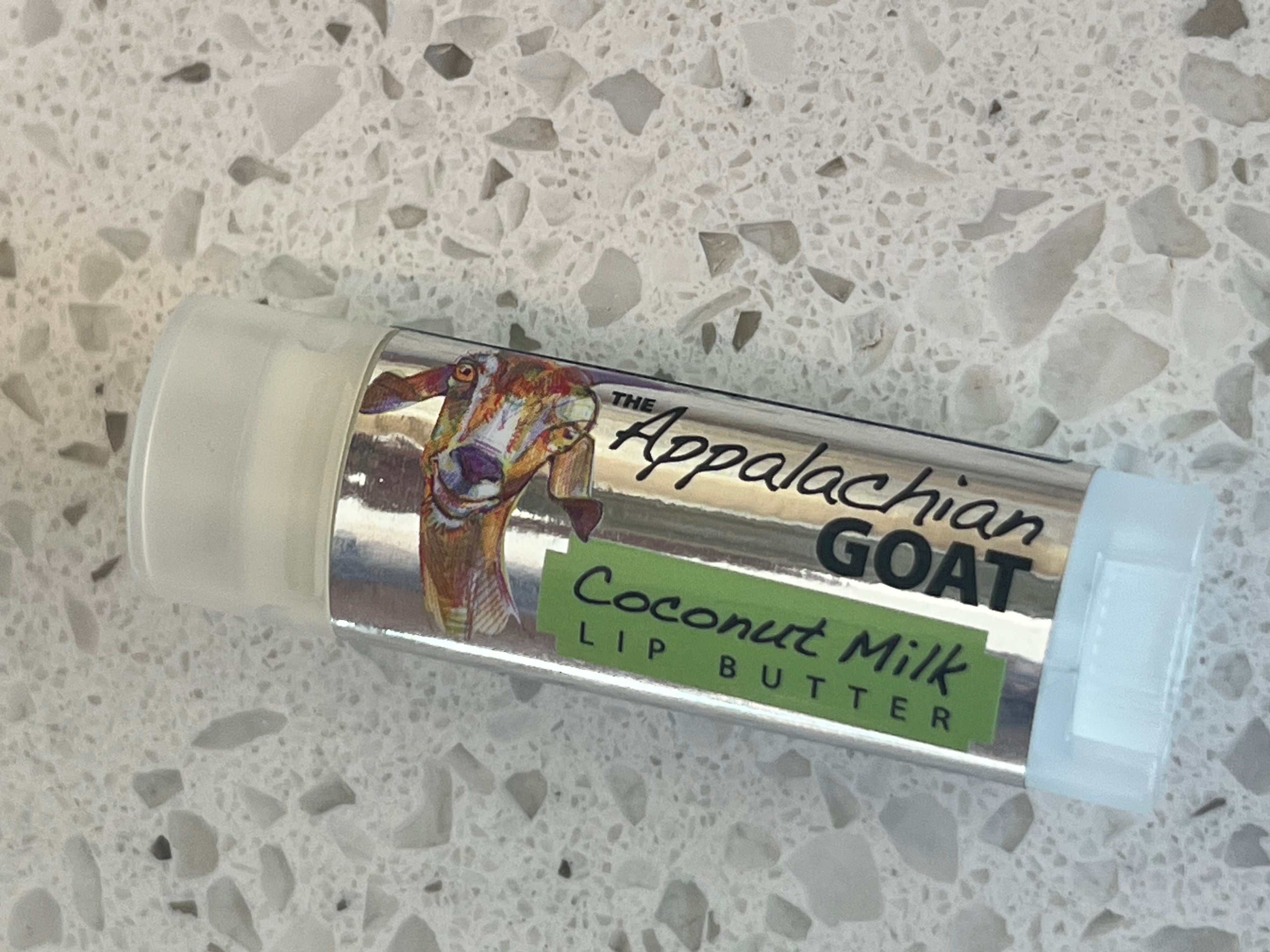 Coconut Milk Luxury Lip Butter by The Appalachian Goat, featuring a smooth, creamy texture in a natural, nourishing lip balm.