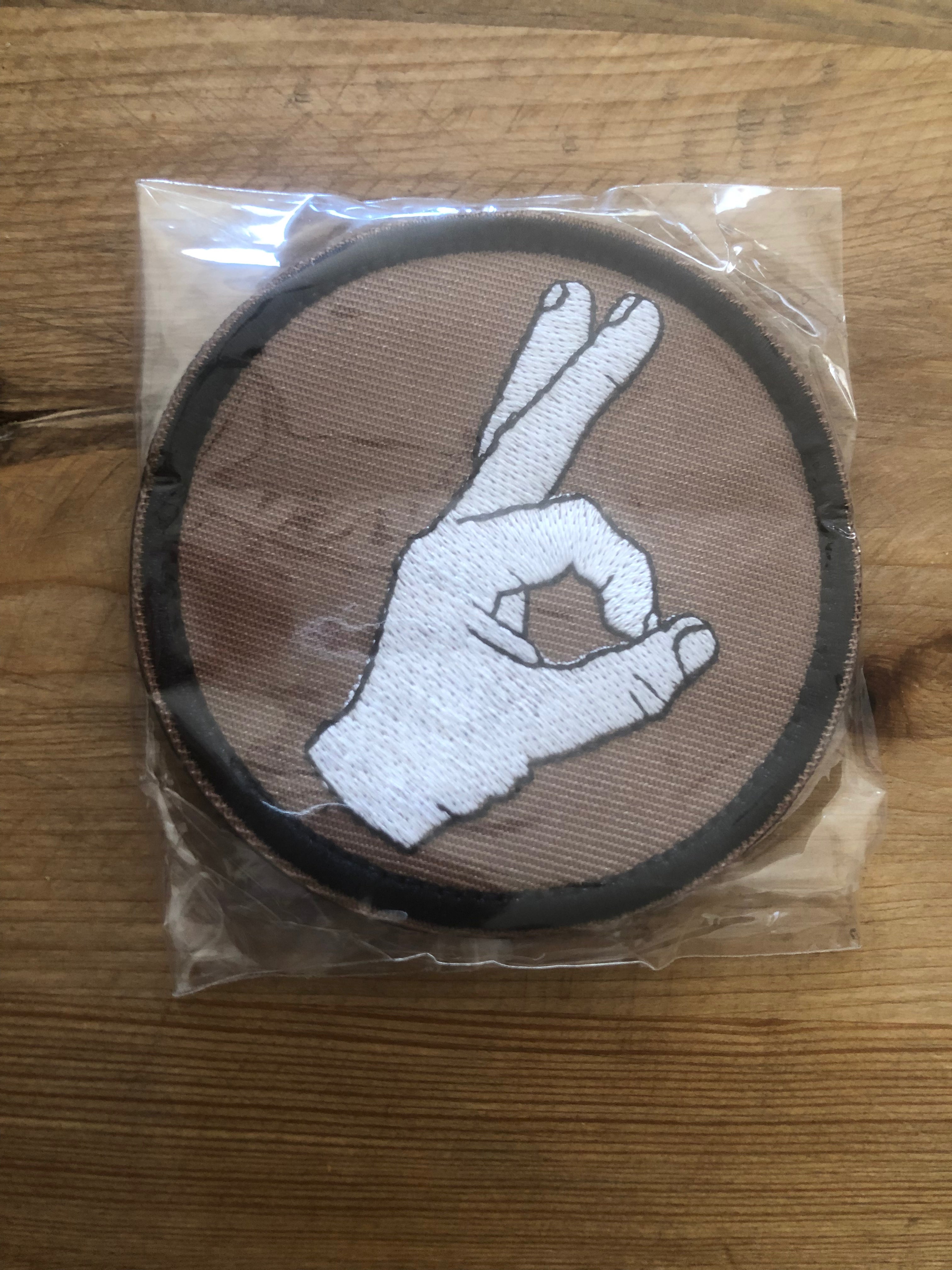 Redemption Tactical Circle Game patch featuring a circular design with tactical-themed graphics on fabric.