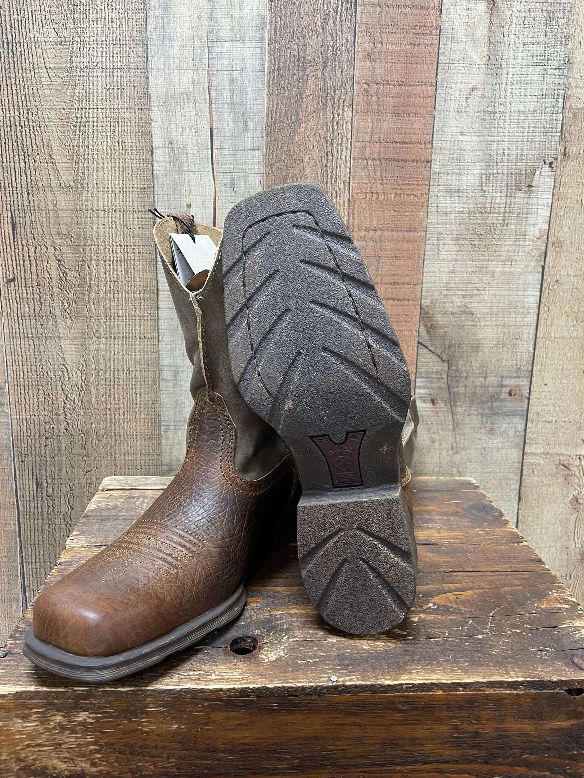 Ariat men's Rambler Square Toe Western boots with brown leather and decorative stitching, showcasing a classic western style.