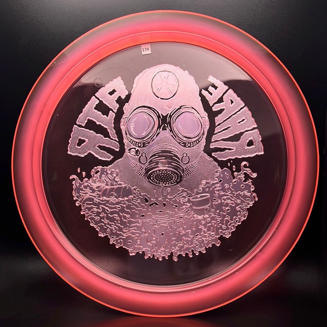 Rare Air Discs Ethos Omen - Radioactive Man Edition disc golf disc with vibrant green and yellow design on a white background.