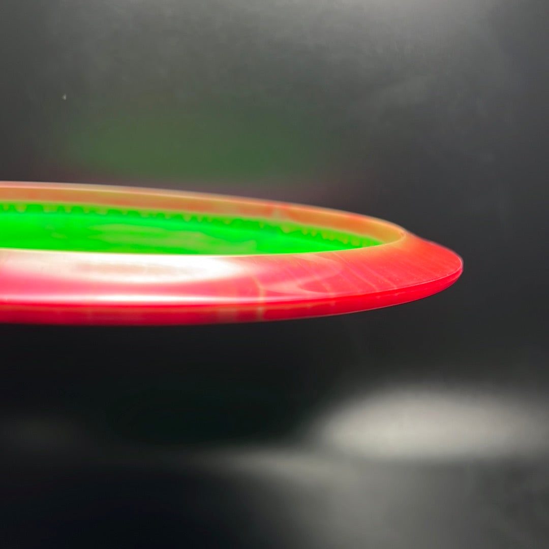 Rare Air Discs Halo S-Blend Exodus disc golf disc with custom RAD Elk stamp, featuring vibrant colors and detailed design.