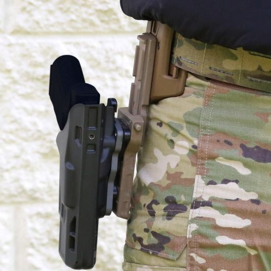 HCC Tactical holster extender with reinforced GRT belt adapter for secure tactical gear attachment.
