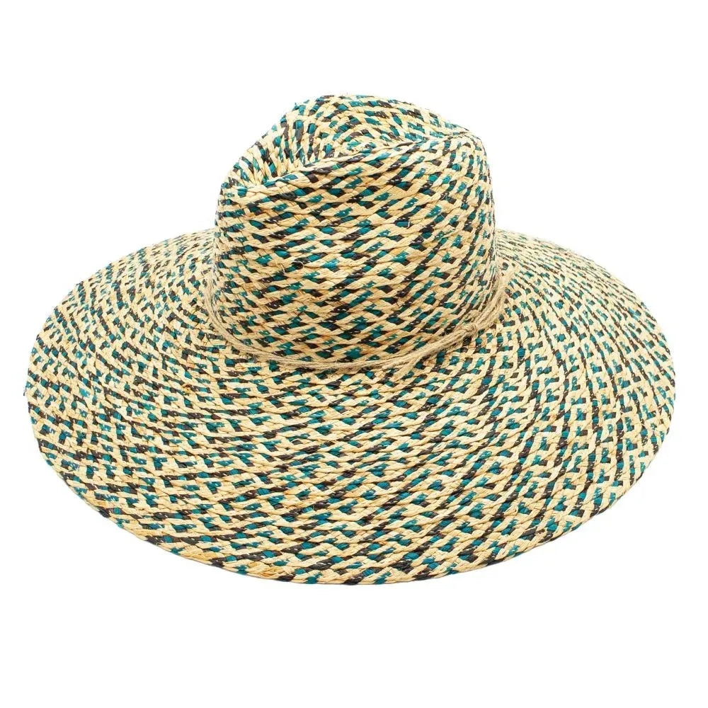 Woman wearing a green Peter Grimm Inca wide brim fedora sun hat, stylish headwear for sun protection and fashion.