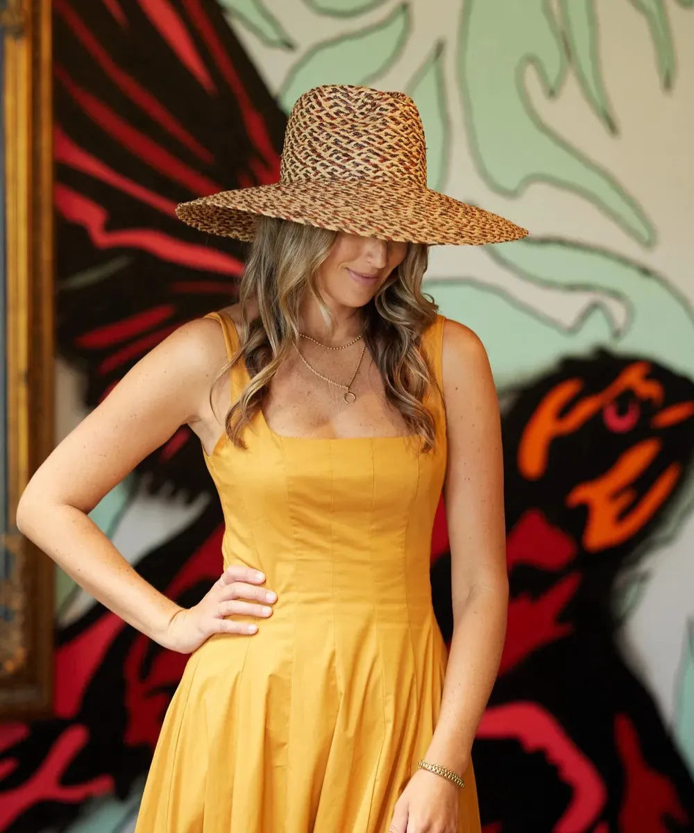 Peter Grimm Inca women's wide brim fedora sun hat with woven straw design and a stylish, breathable headwear accessory.