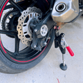 JSAMAE™ Portable Motorcycle Lift Jack by Bean's Moto Booth, shown in use for lifting a motorcycle securely.