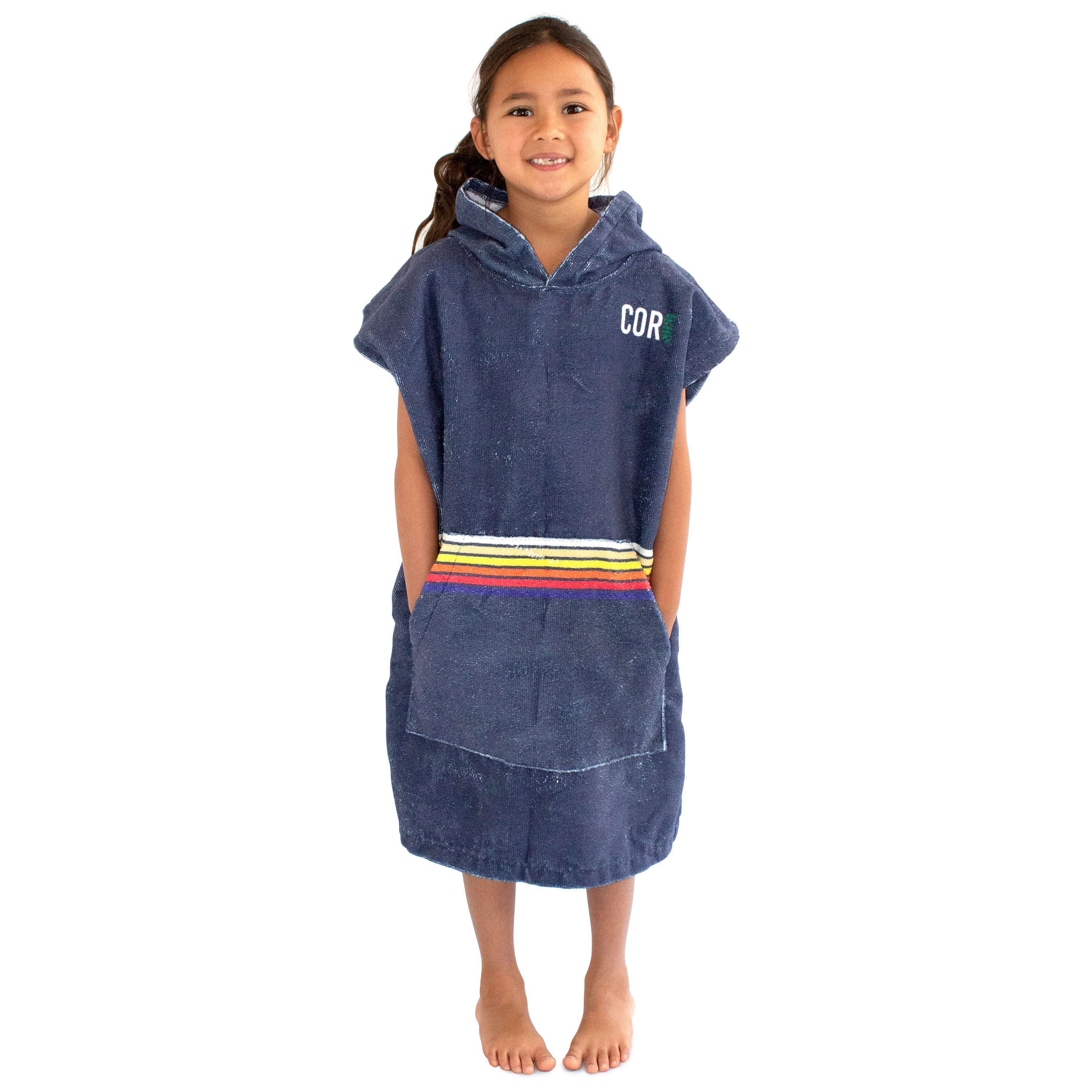 Kids wearing Knight Rider Changing Poncho by COR Surf, a colorful hooded towel for boys and girls, perfect for beach or pool.