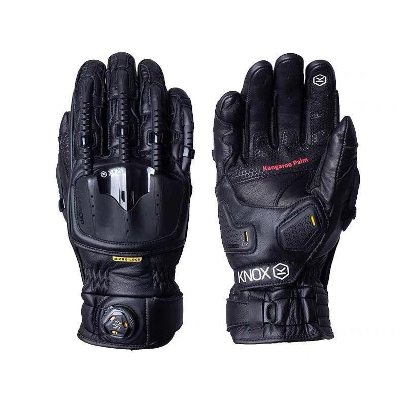 Black Knox™ Handroid MK4 motorcycle gloves with protective armor and textured palms, designed for motorcycle riding safety.