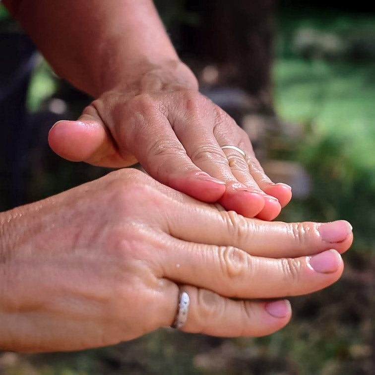 Colorado Aromatics knuckle balm, moisturizing body balm in a jar, with natural ingredients and smooth application on knuckles.