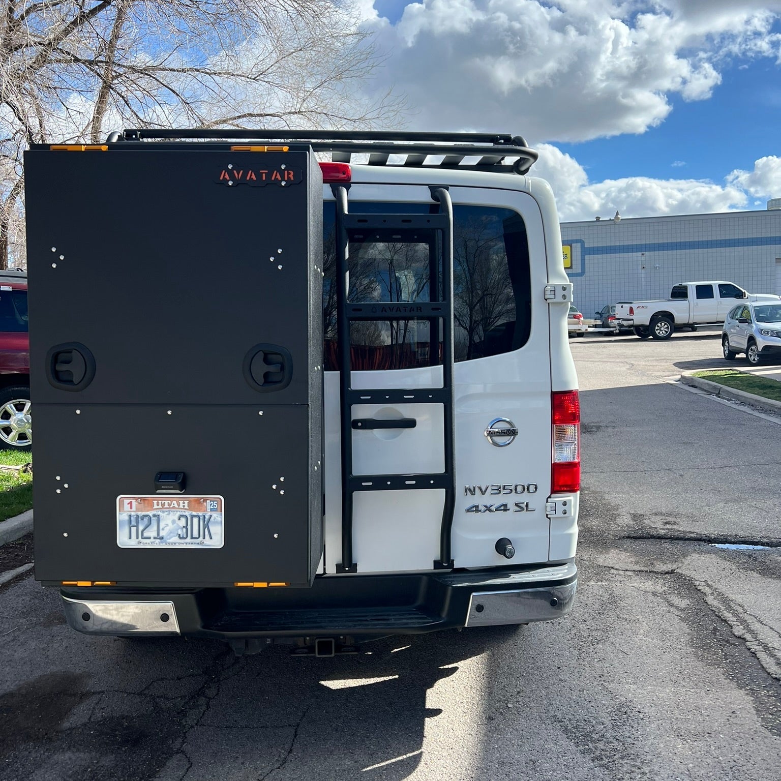 Avatar Offroad NV3500 rear ladder mounted on a vehicle, showcasing durable design and easy access for cargo loading.