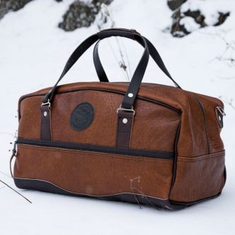 Backcountry Sportsman Bison Leather Weekender Duffel bag with sturdy handles and spacious interior, ideal for travel and weekend trips.