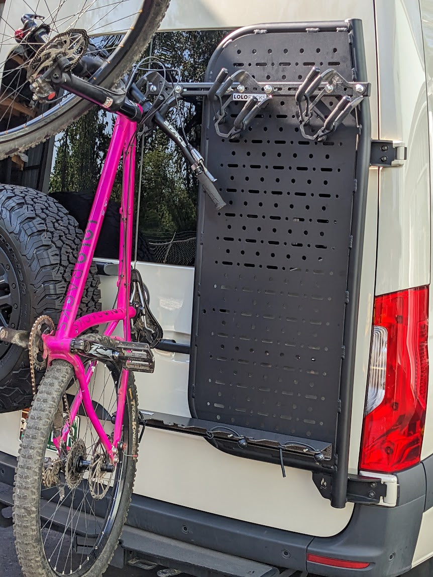 Lolo Racks Cargo Panel Bike Rack Kit mounted on van Molle panel, designed for secure bike transportation in sprinter vans.
