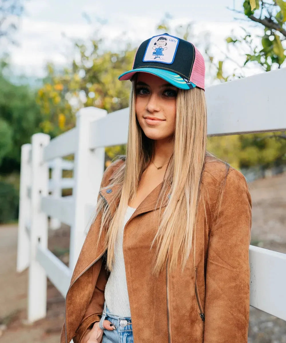 Peter Grimm Peanuts Lucy pink trucker cap featuring mesh back and adjustable strap, stylish headwear for casual wear.
