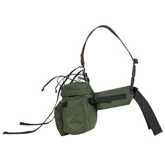 Backcountry Sportsman All Day Lumbar Pack shown from the side, featuring multiple compartments and adjustable straps for outdoor activities.