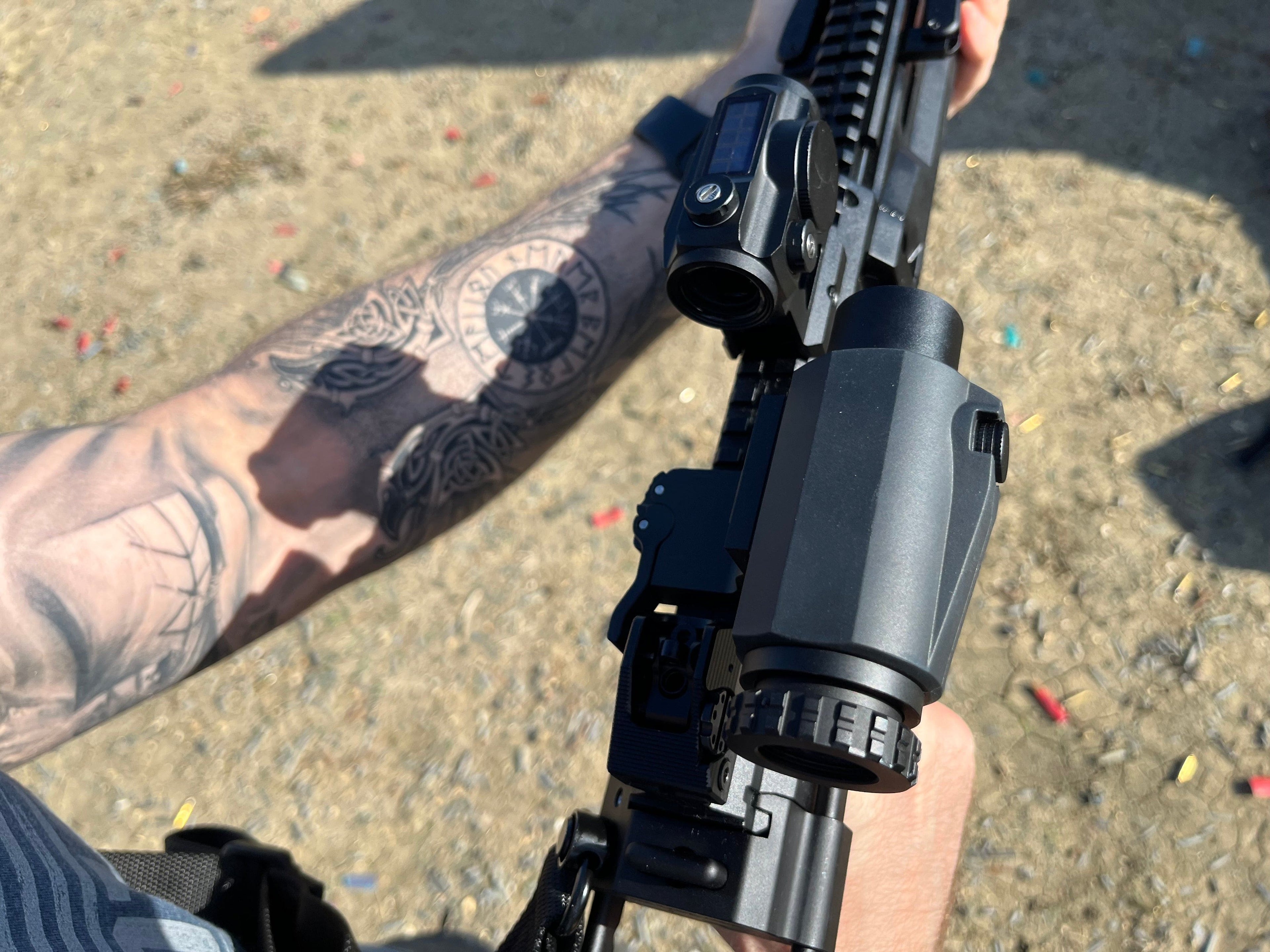SFT2 Tactical Dragoon 3x Magnifier with lens and mounting system for enhanced target clarity during shooting or tactical use