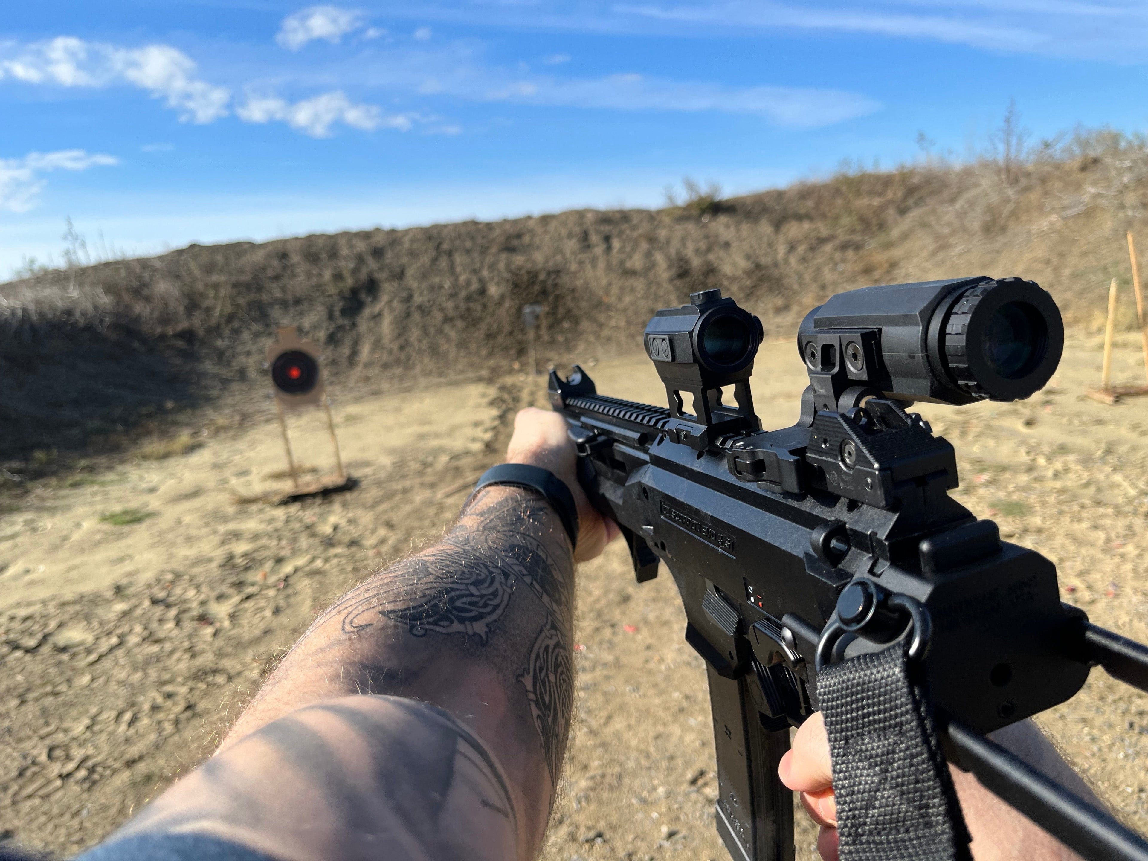 SFT2 Tactical Dragoon 3x Magnifier showing a compact, clear glass magnification device with tactical mount for firearms.