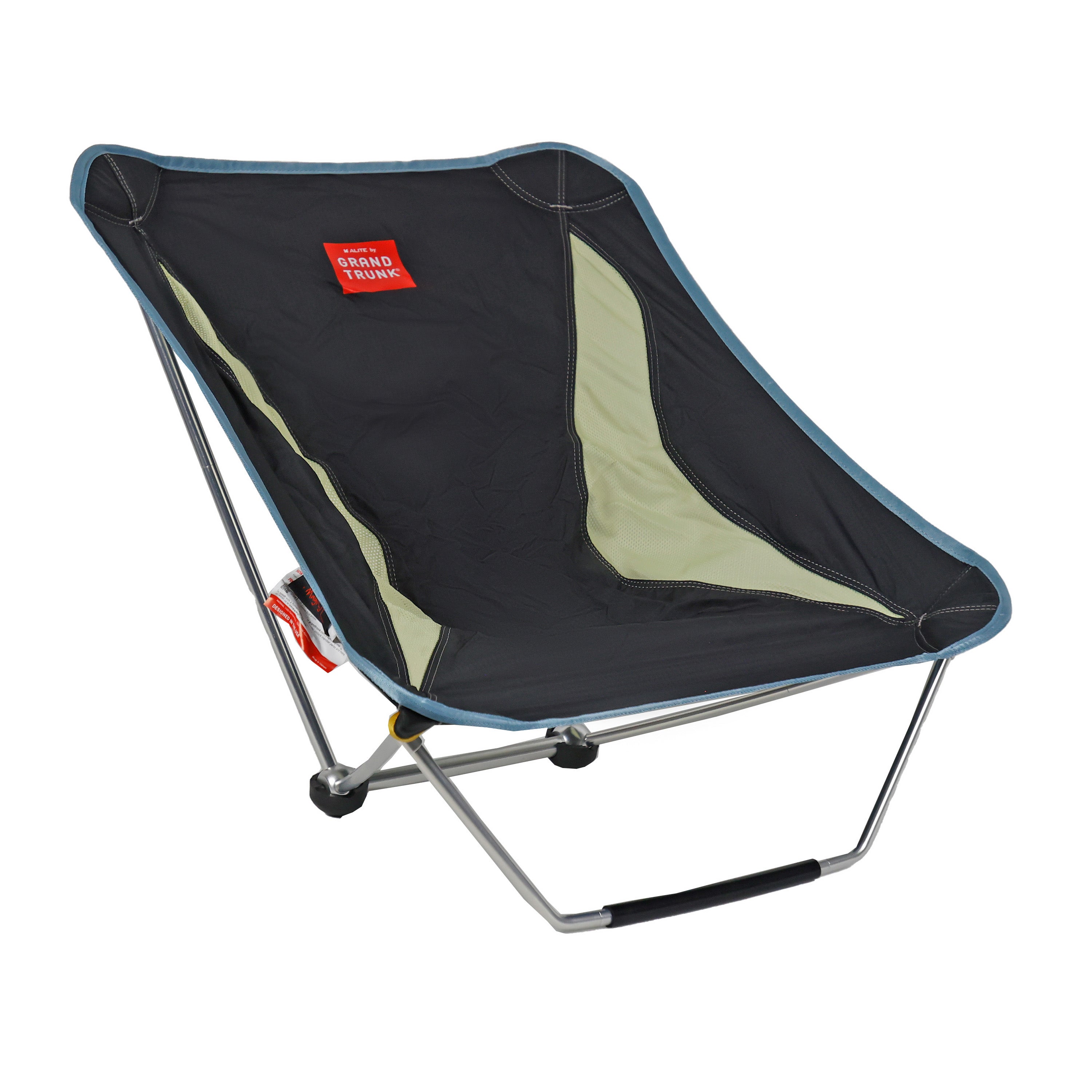 Black GrandTrunk Mayfly Low Ground Collapsible Chair set up outdoors, showing lightweight frame and compact design for portable seating.