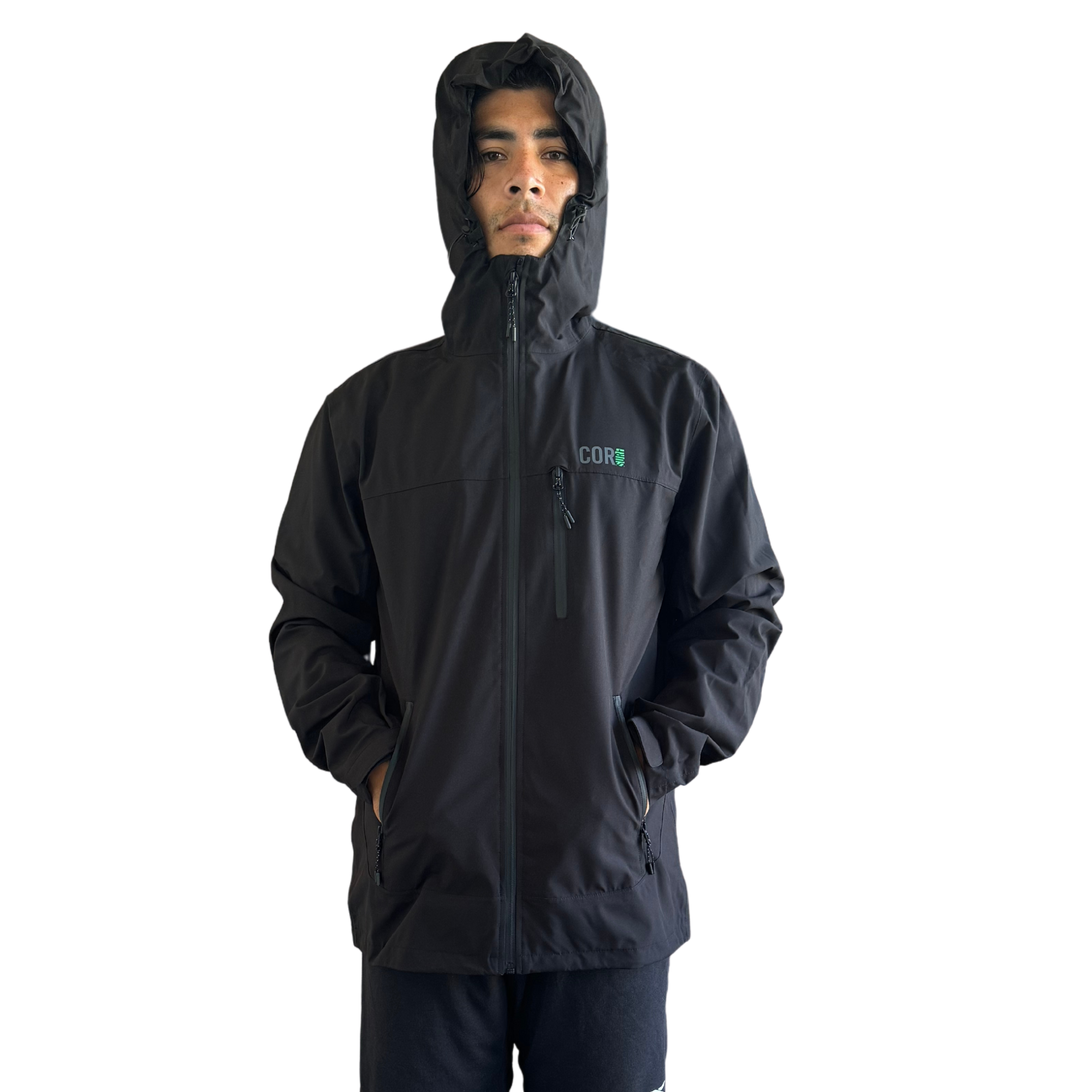 Unisex COR Surf Huakai Travel Rain Jacket with hood, lightweight and packable for outdoor protection in wet weather.