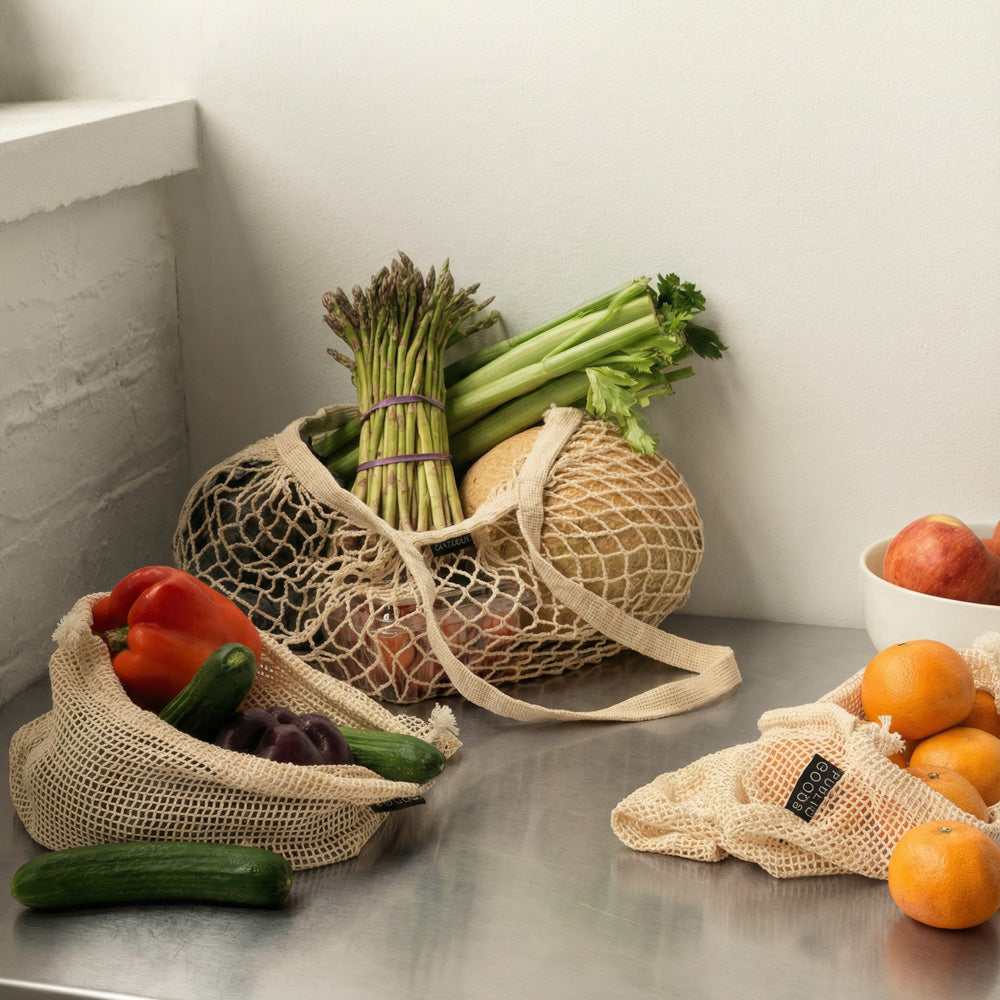 Public Goods organic cotton mesh tote bag with handles, shown in a lifestyle setting, perfect for household use and eco-friendly shopping.