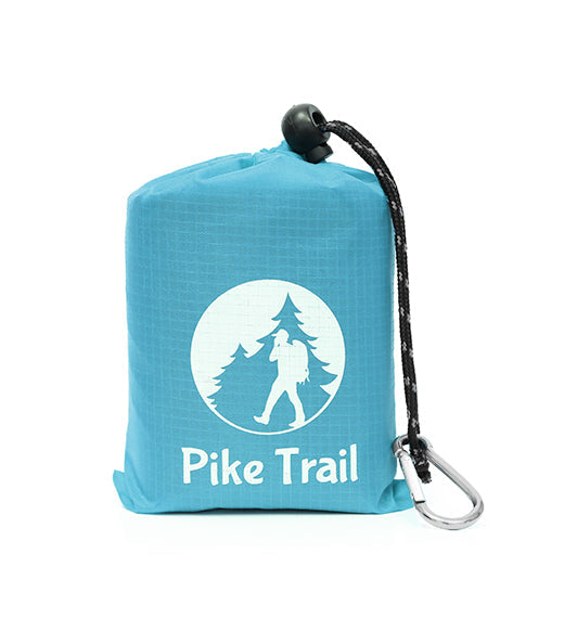 Metallic blue Pike Trail Pocket Blanket spread out, compact and portable outdoor blanket for picnics and camping.