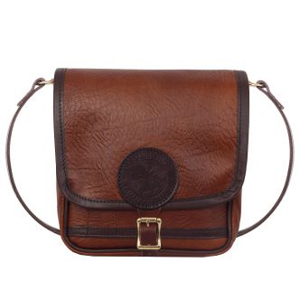 Backcountry Sportsman Bison Leather Mini Haversack in brown with adjustable strap and compact design for everyday use.