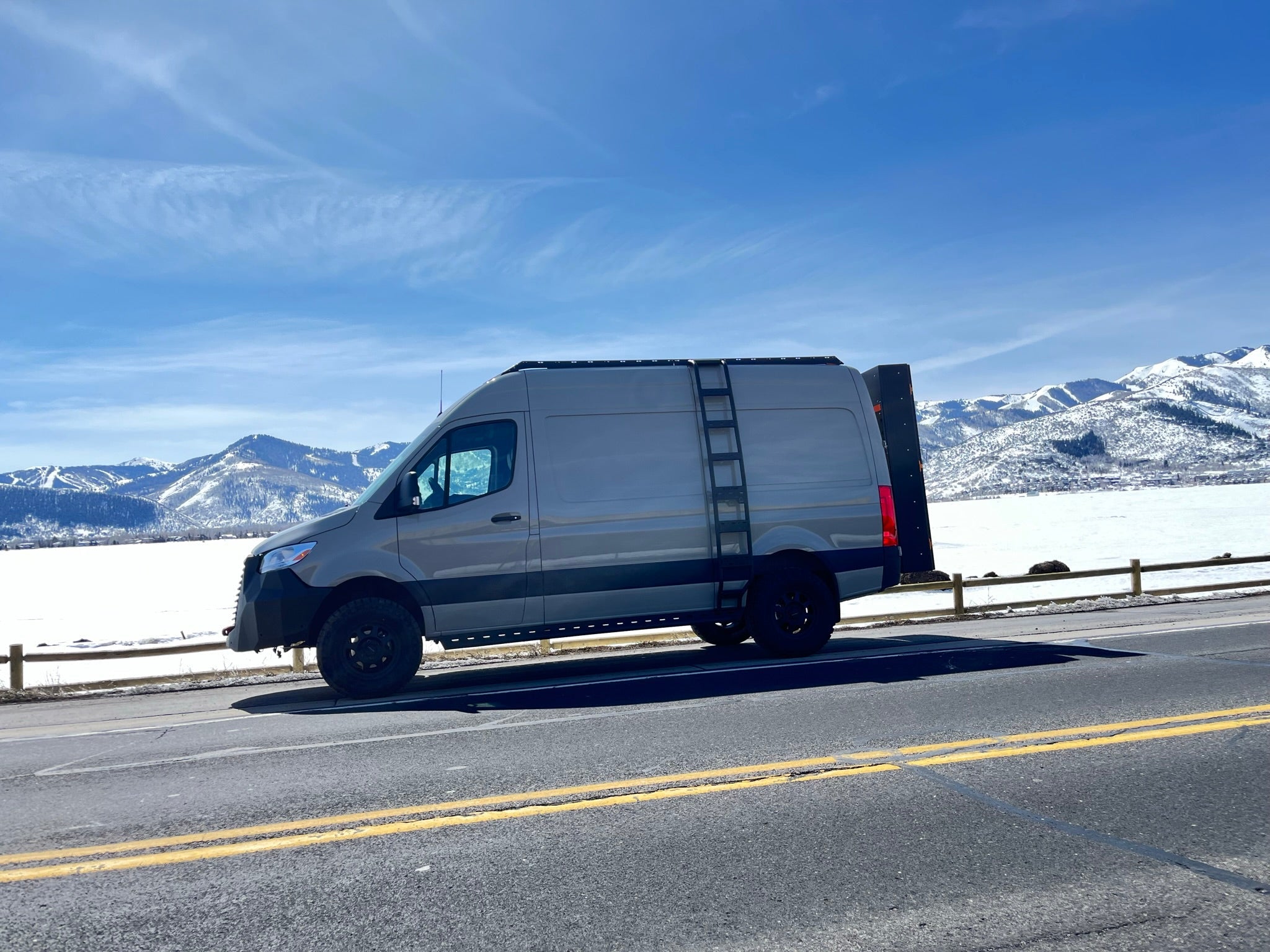 Minimalist roof rack for Sprinter vans from avatar offroad, designed as a low profile, durable vehicle storage solution.