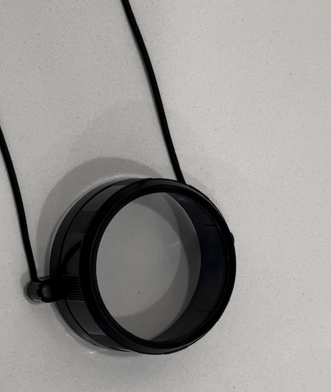 SFT2 Tactical lens cover designed for protecting optics with durable material and secure fit.