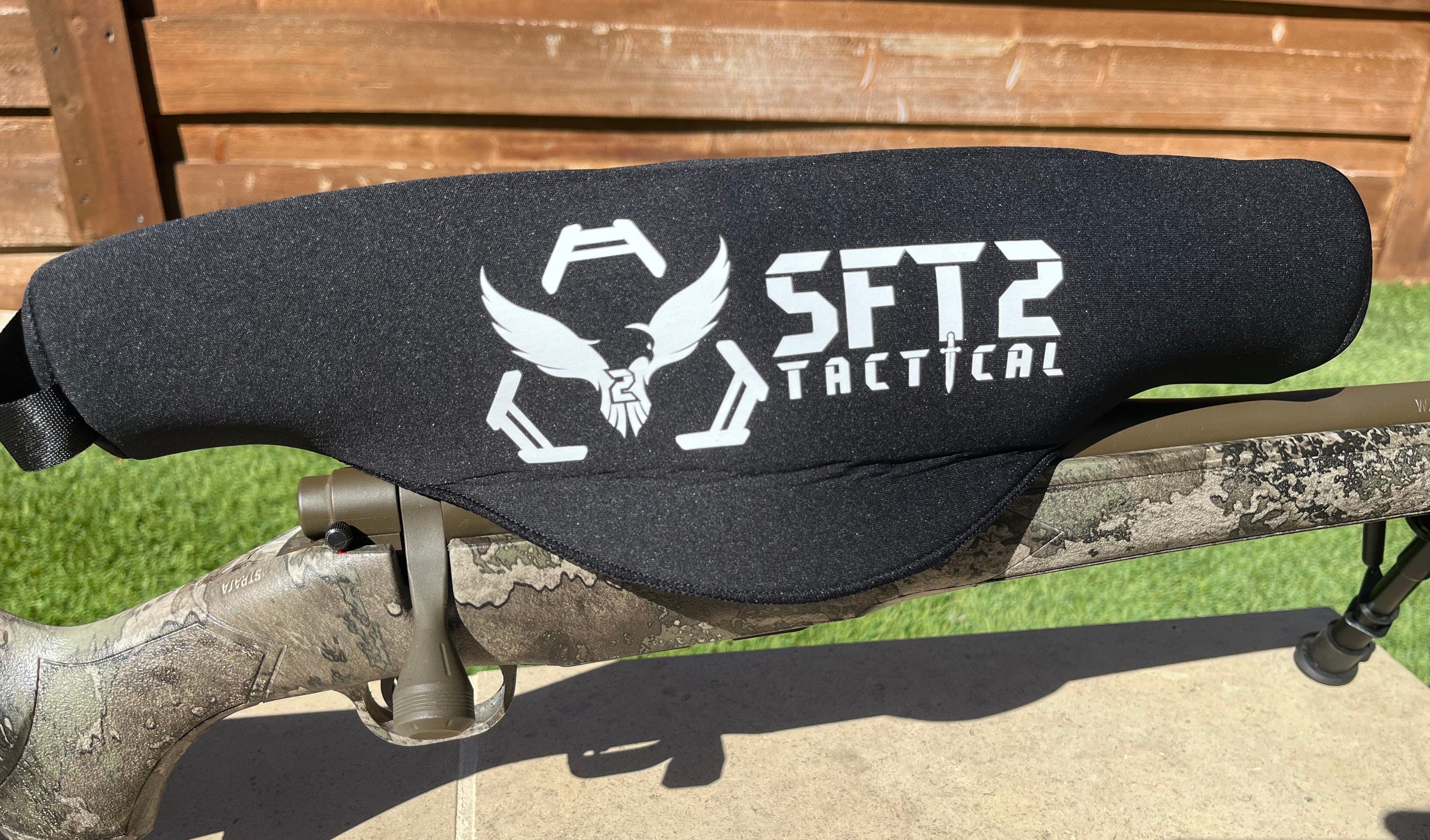 SFT2 Tactical Scope Cover in two sizes, designed for protecting rifle scopes from dust and debris.