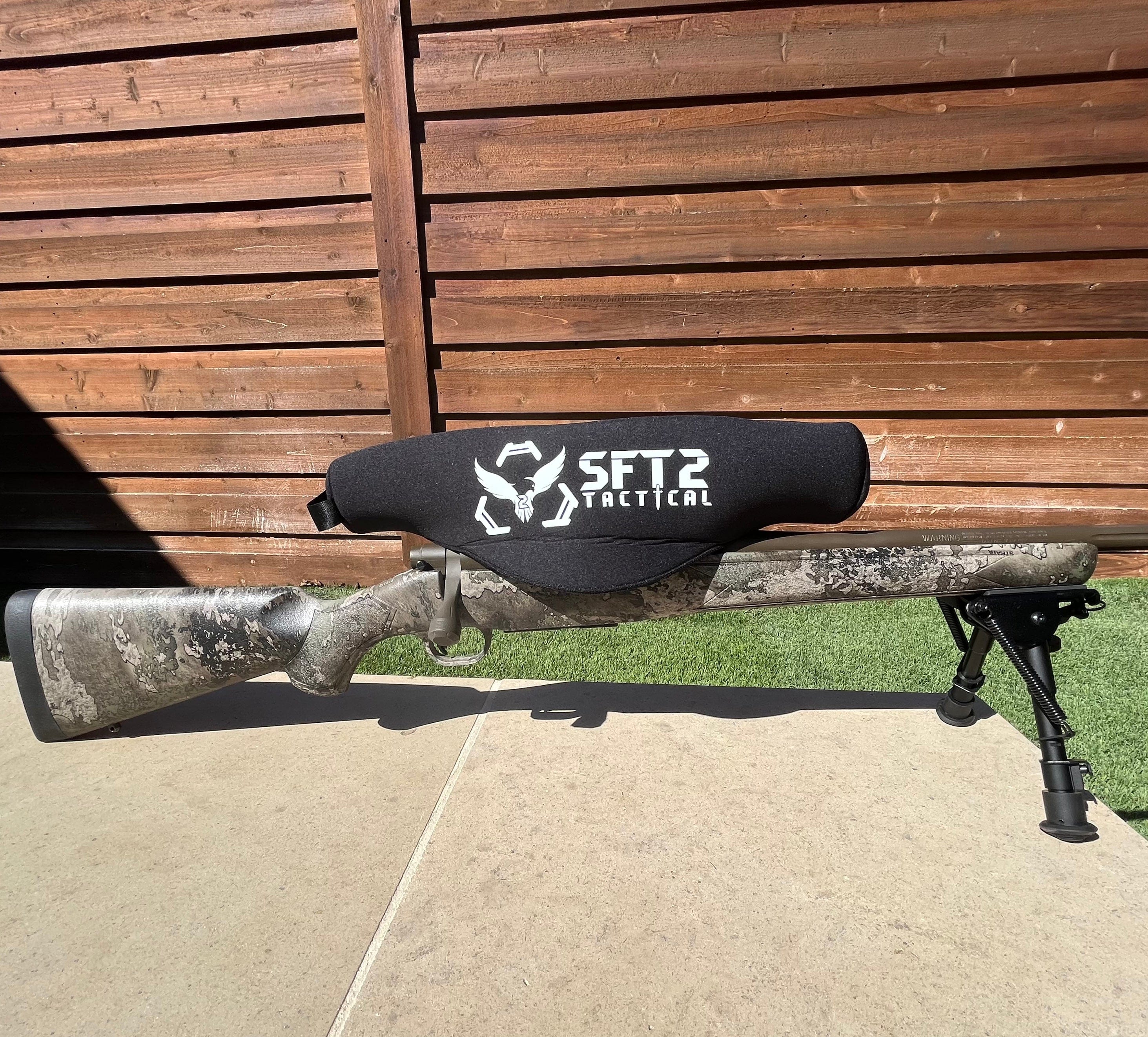 SFT2 Tactical Scope Cover in two sizes, designed for protecting tactical scopes during outdoor use.