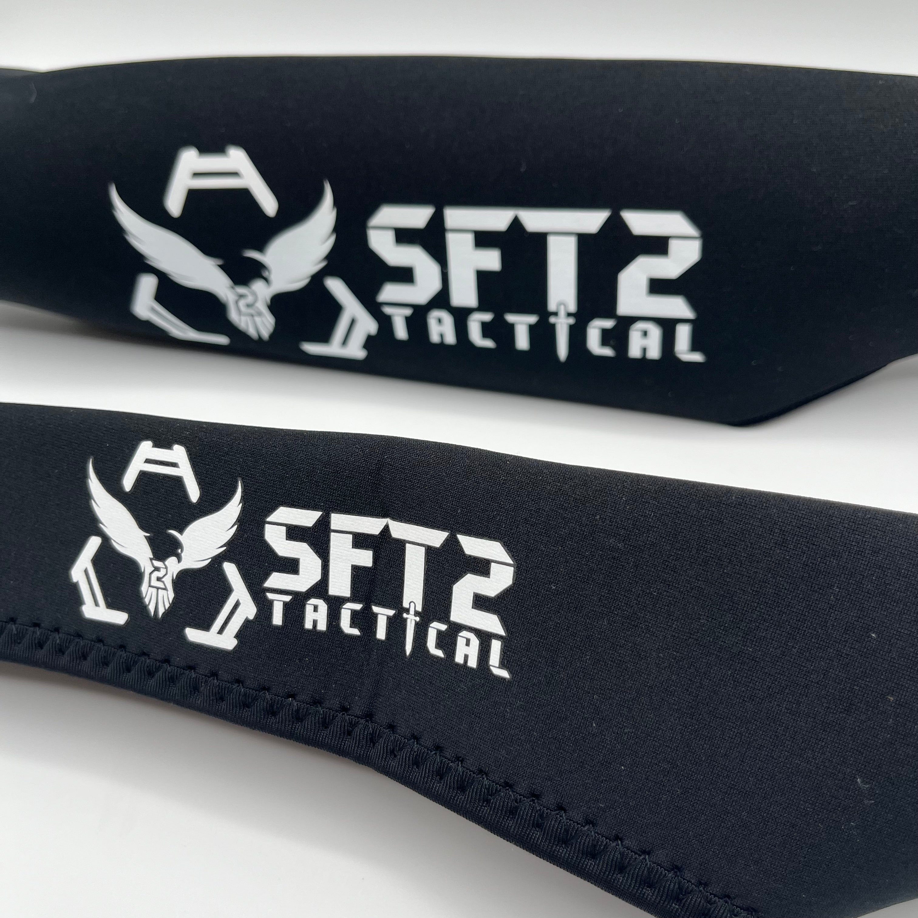 SFT2 Tactical Scope Cover in two sizes, designed for effective protection of tactical scopes during outdoor use.