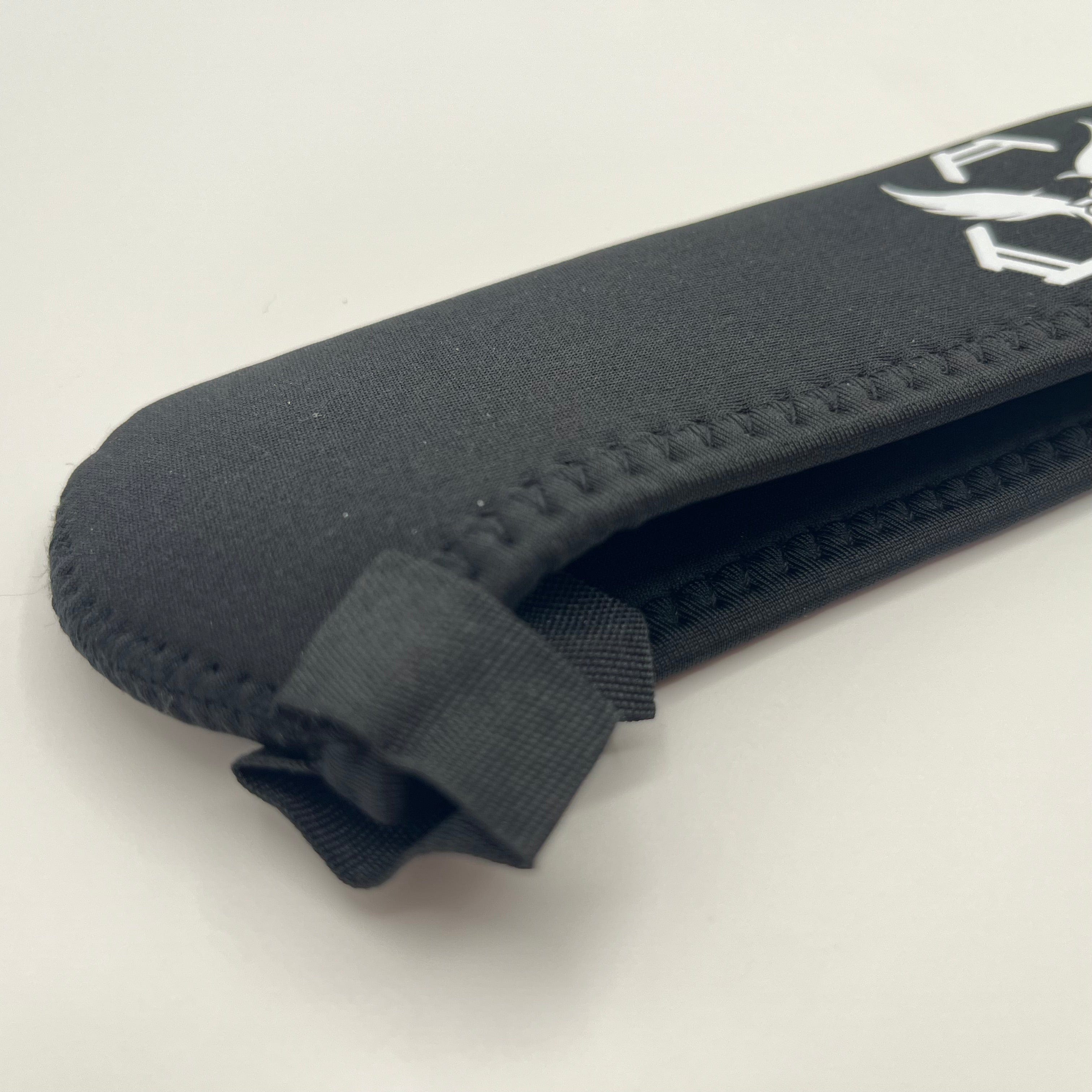 SFT2 Tactical Scope Cover in two sizes, designed for protecting tactical scopes during outdoor activities.