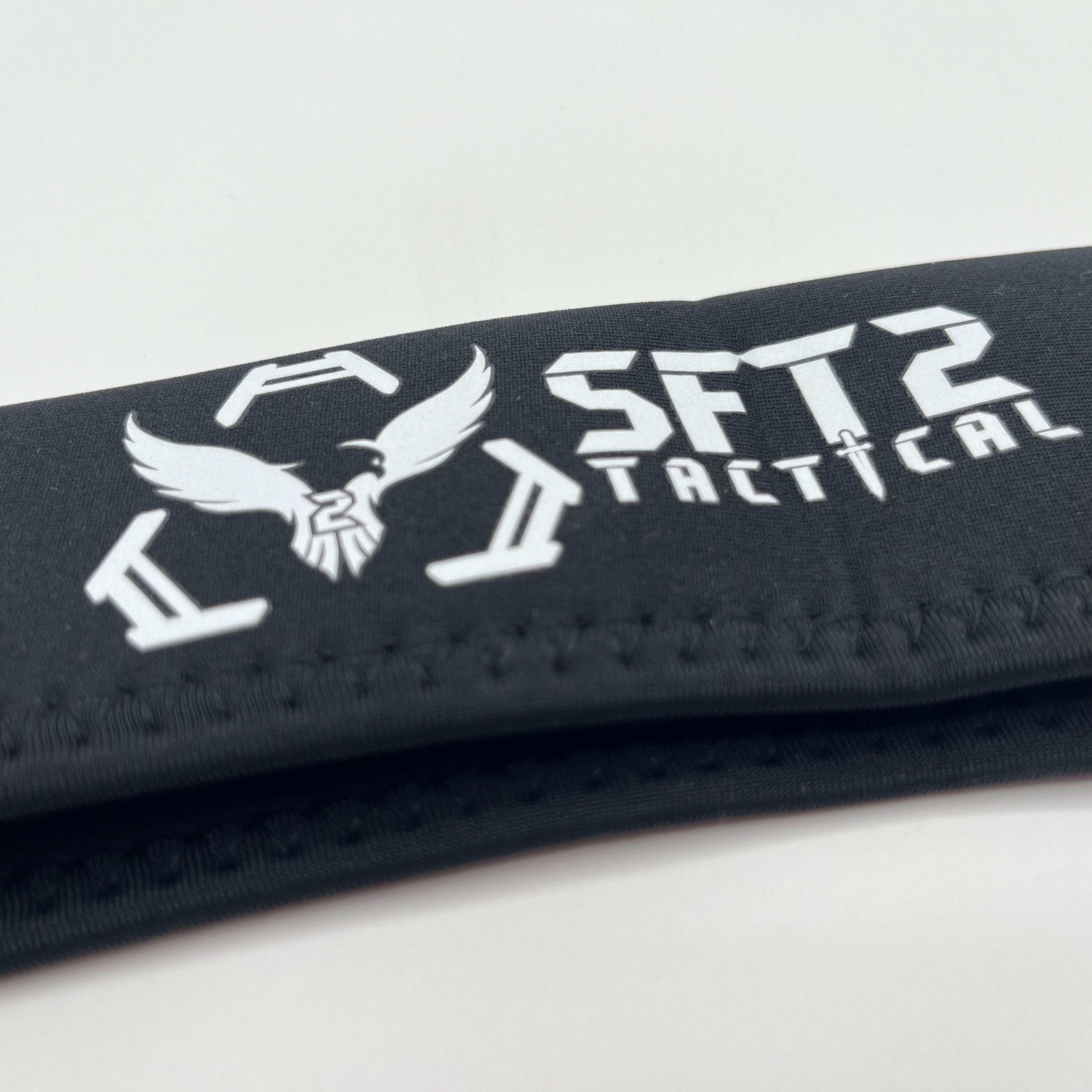 SFT2 Tactical Scope Cover in two sizes, designed for protecting tactical scopes during outdoor use.