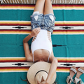Teal Sunset Baja Diamond Yoga Blanket by West Path, woven Baja blanket featuring diamond patterns and vibrant sunset colors.