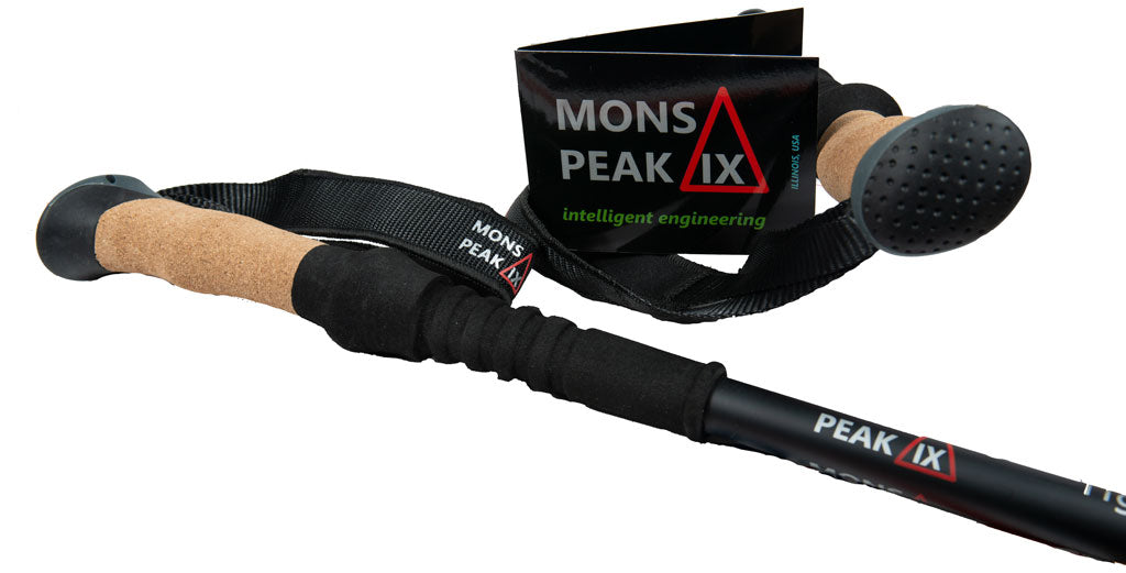 Backcountry Sportsman Tiger Paw 7075 trekking poles with ergonomic grips and adjustable shafts for hiking stability.