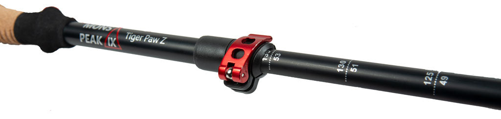 Backcountry Sportsman Tiger Paw Z Trekking Poles with adjustable shafts and ergonomic grips for hiking on rugged trails.
