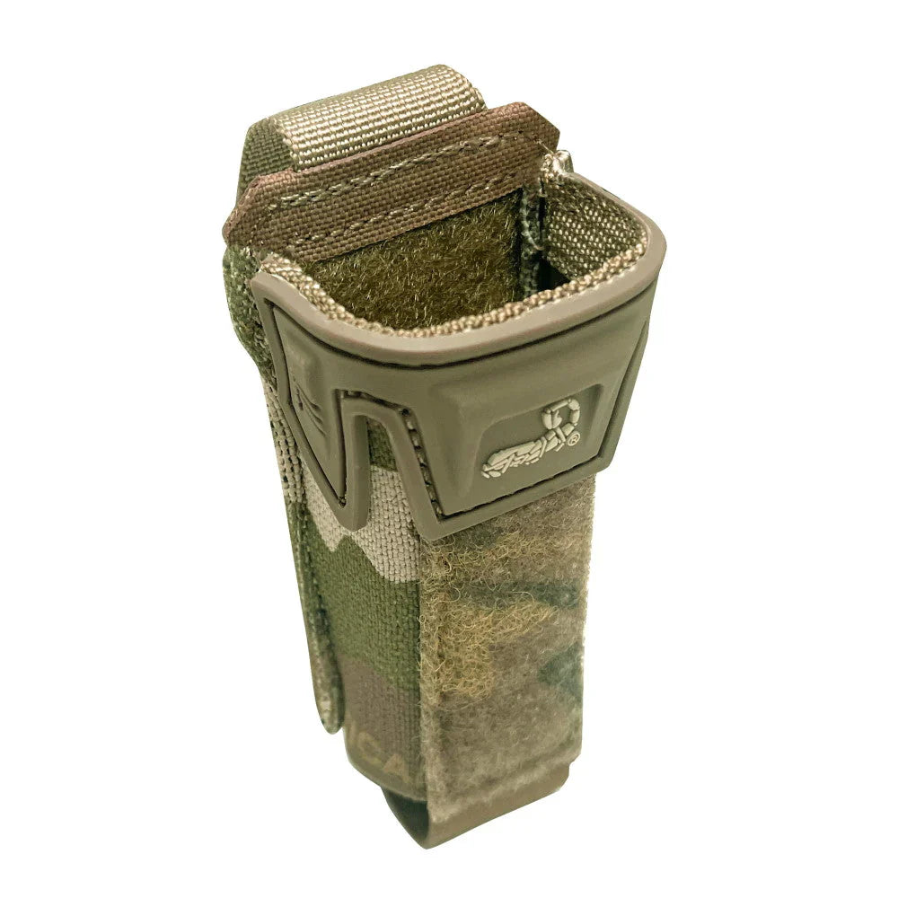 HCC Tactical pincer pistol single pouch for tactical gear, shown attached to a firearm magazine well in black and durable fabric.
