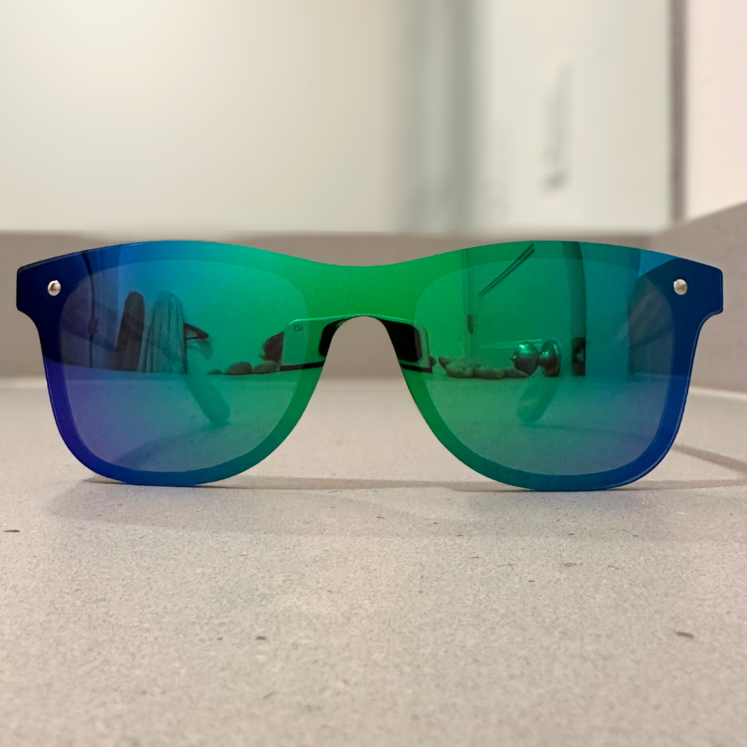 Eastern Outer Natalia zebrawood sunglasses with green-tinted lenses and stylish frame, showcasing a unique zebrawood design.