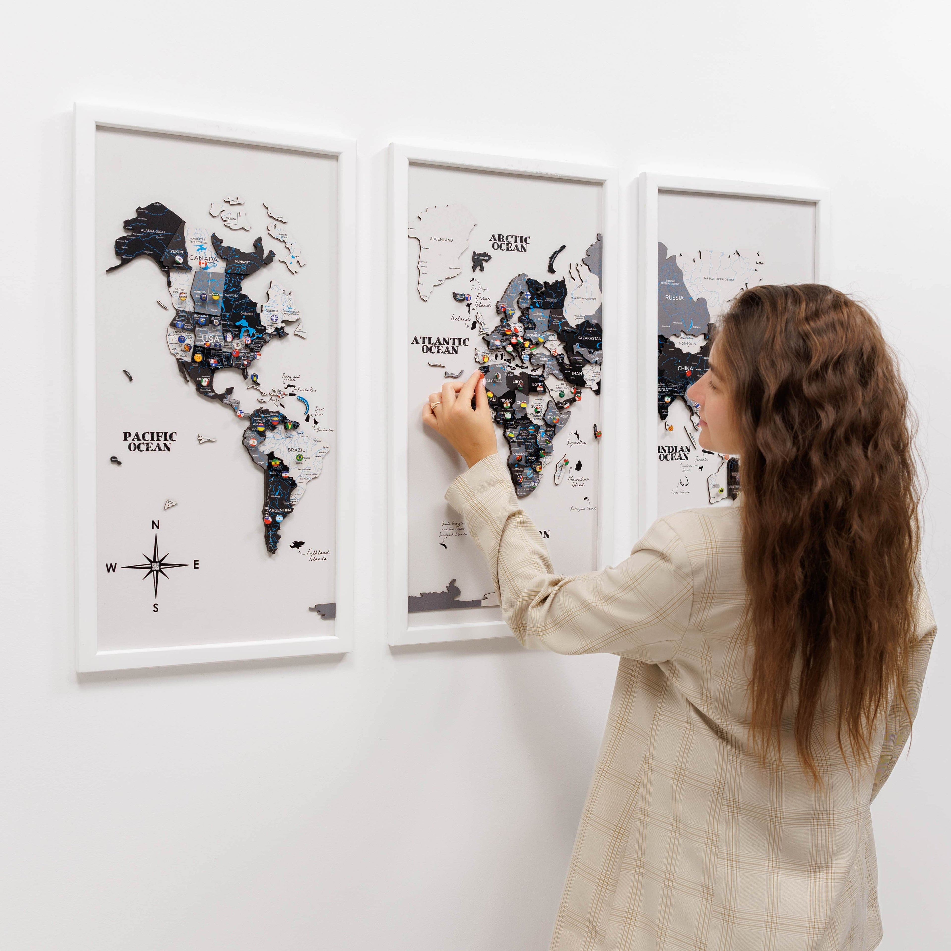 Wooden Triptych Wall Art of a world map by Enjoy The Wood, featuring natural wood finish in a three-panel Nordic design.