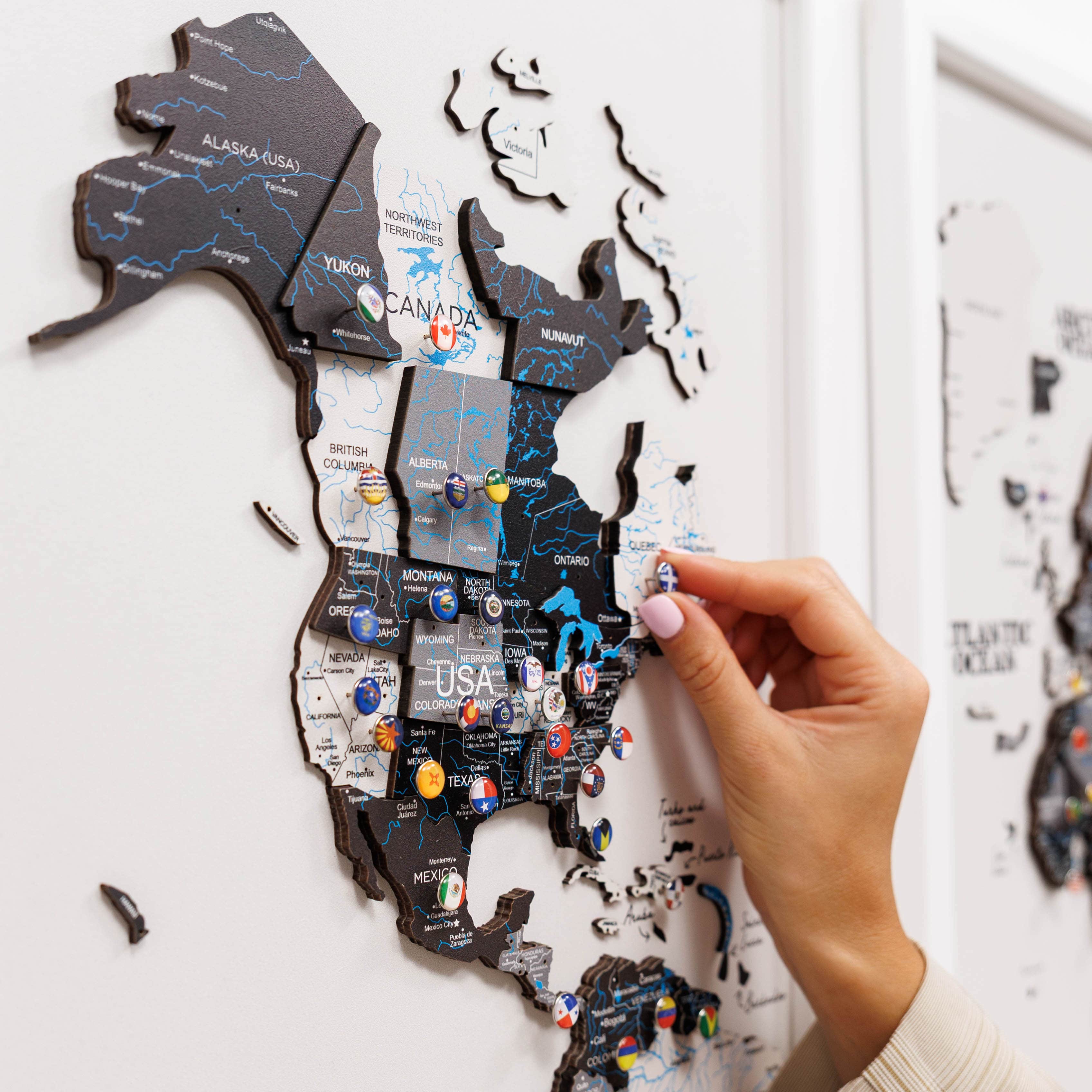 Wooden triptych wall art featuring a detailed Nordic-style world map by Enjoy The Wood, divided into three panels.