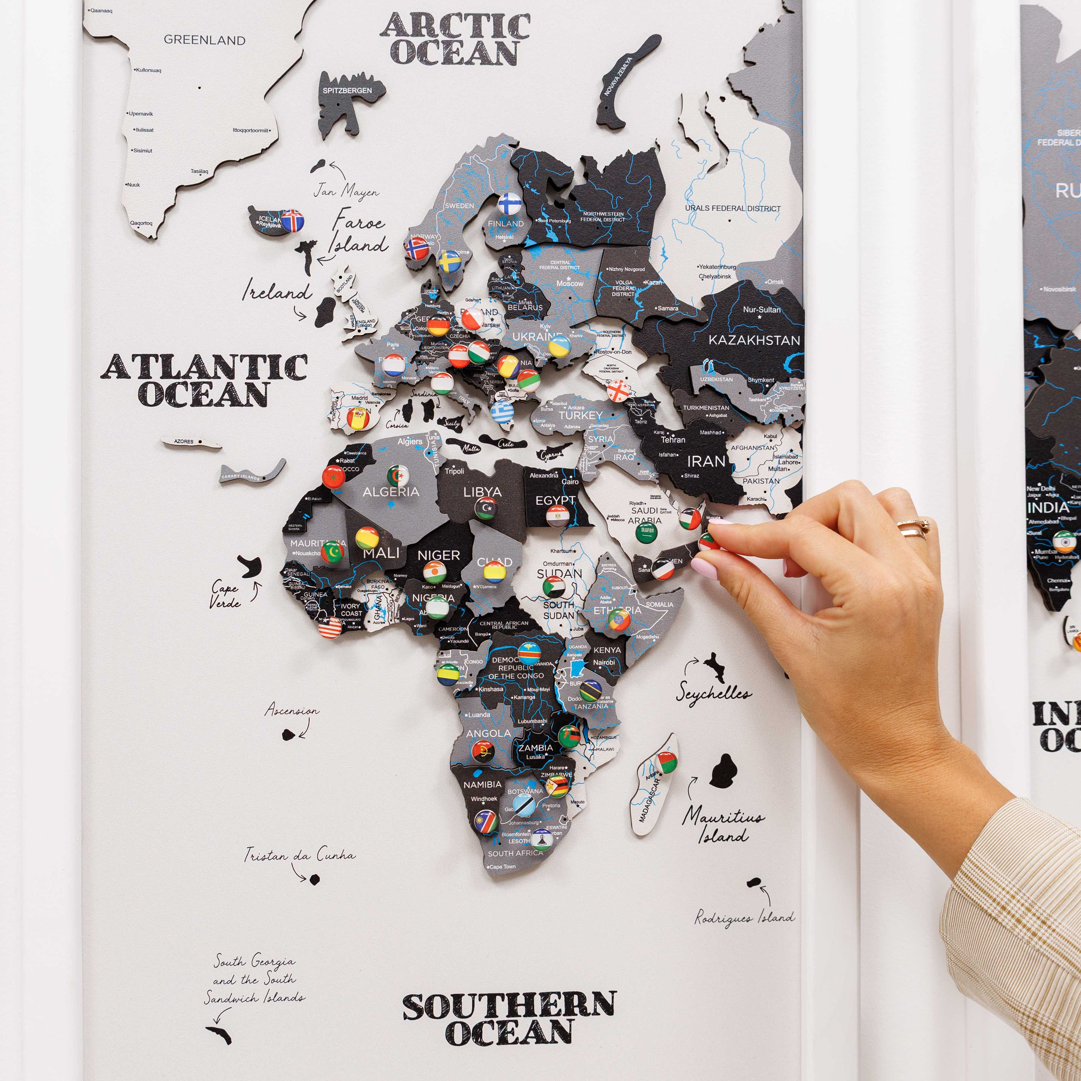 Wooden triptych wall art featuring a detailed world map by Enjoy The Wood, displayed on a neutral background.