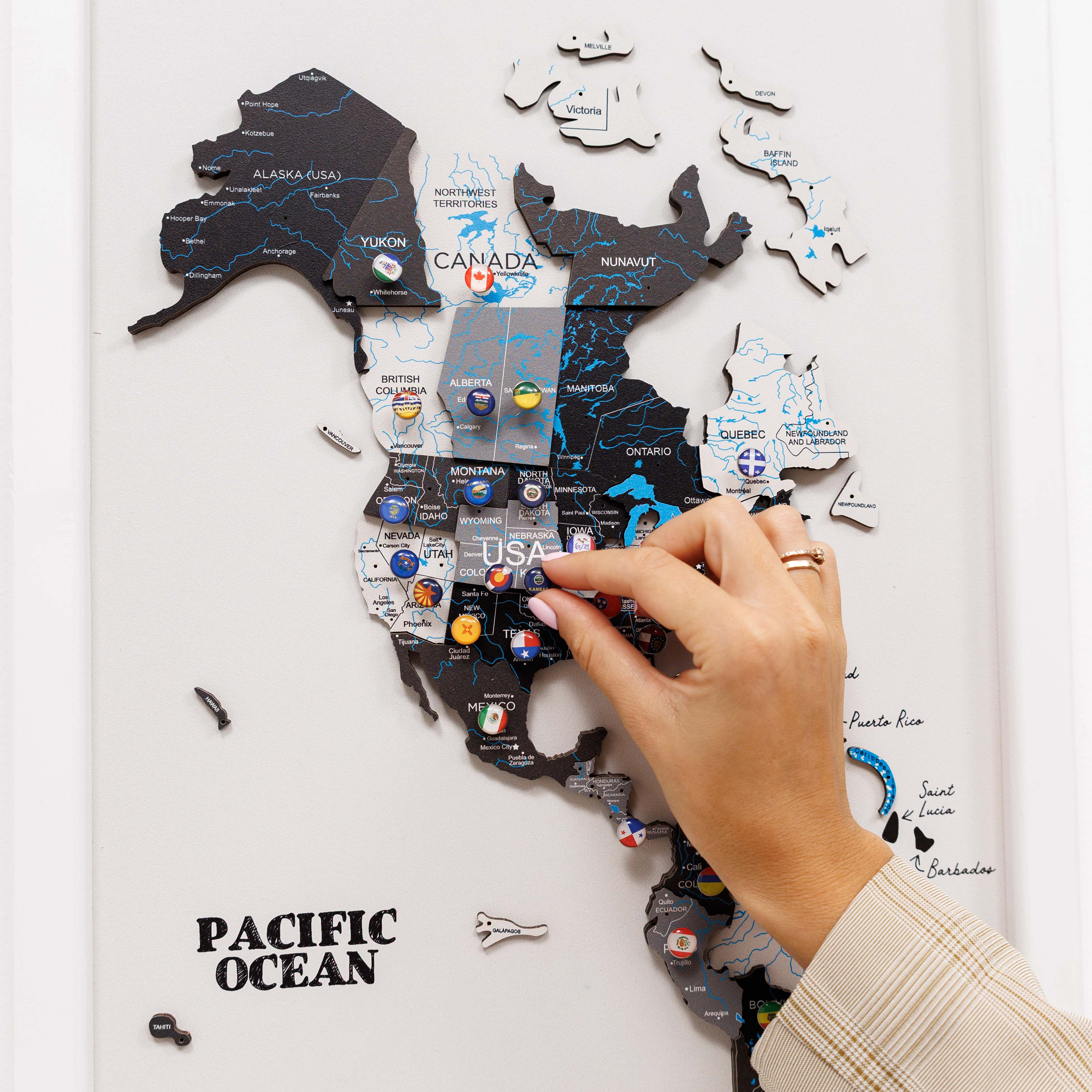 Wooden triptych wall art featuring a detailed wooden world map by Enjoy The Wood, divided into three panels for modern wall decor.