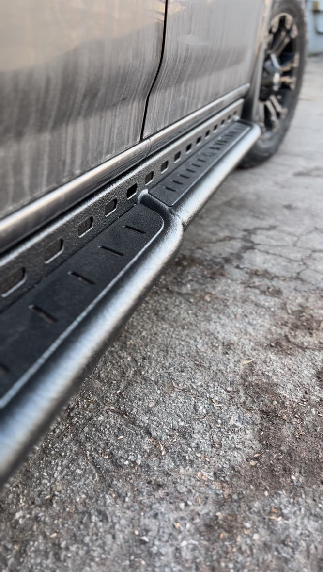 Avatar Offroad NV3500 RockBody side steps attached to a vehicle, providing easy access and rugged style for off-road trucks.