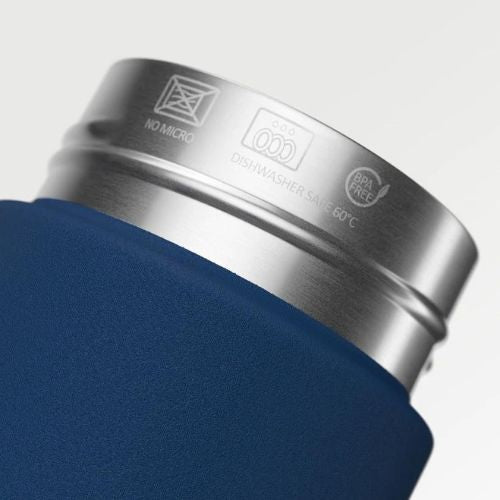 Close-up of the Ocean Bottle insulated water bottle top by COR Surf, showing the lid and spout for hot or cold beverages.