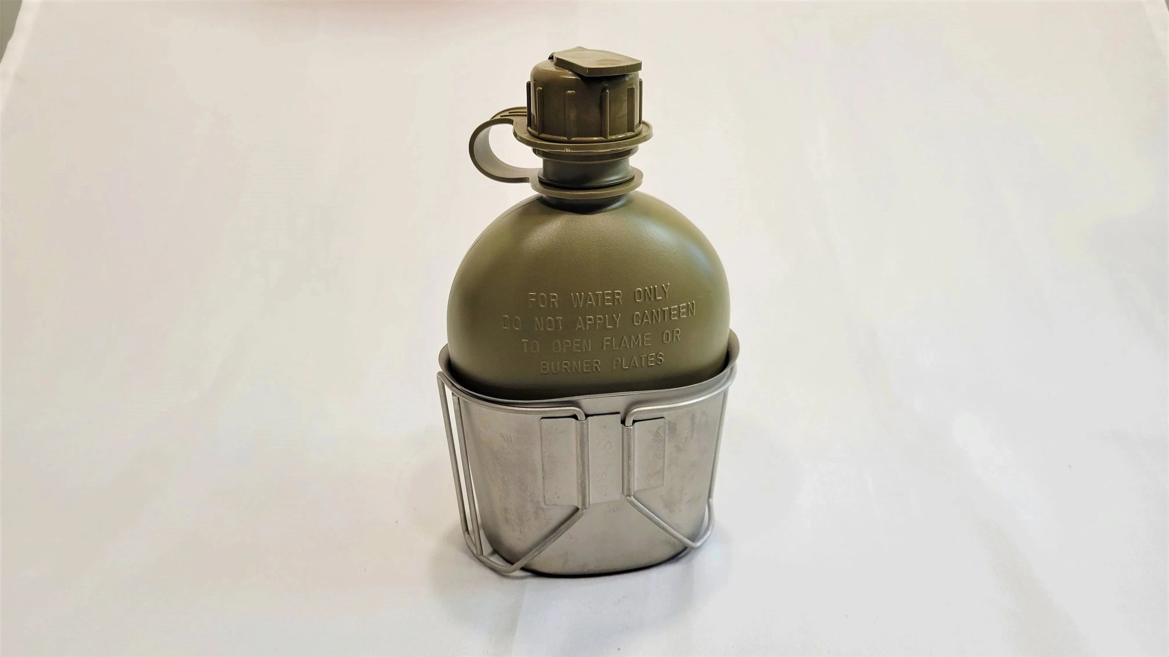 OneThiefSurplus 1 Qt Canteen with Cup, Canteen Cup, and Stove Stand Package for outdoor camping and hiking.