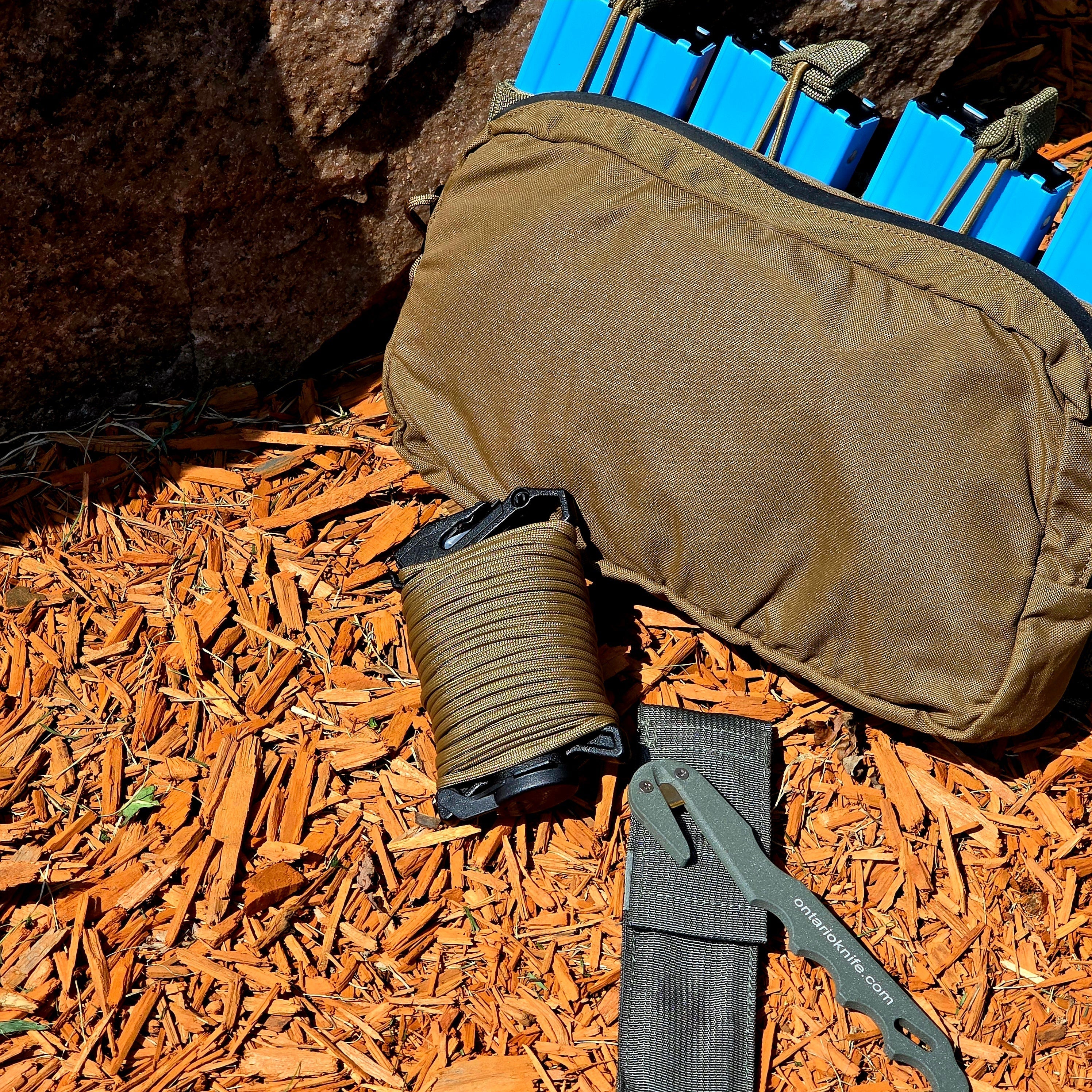Onethiefsurplus 50-foot Atwood Rope Ready Rope for camping and hiking, displayed coiled on a rugged outdoor background.