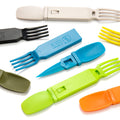 Onethiefsurplus camping and hiking fork, knife, and spoon utensil set with stainless steel tools on a outdoor camping table.