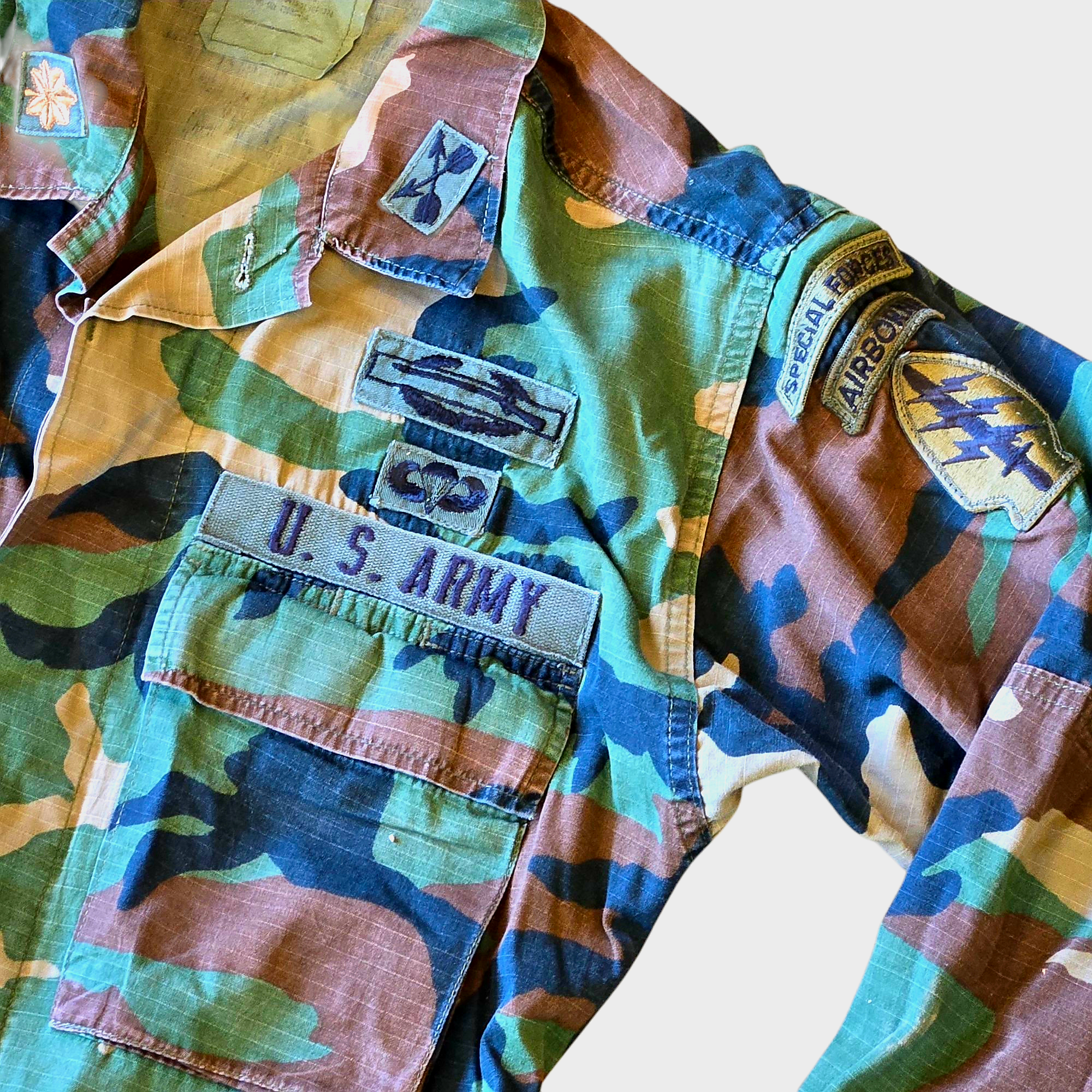 Genuine M81 BDU shirt from onethiefsurplus, military-style camouflage BDU uniform for camping and hiking activities.