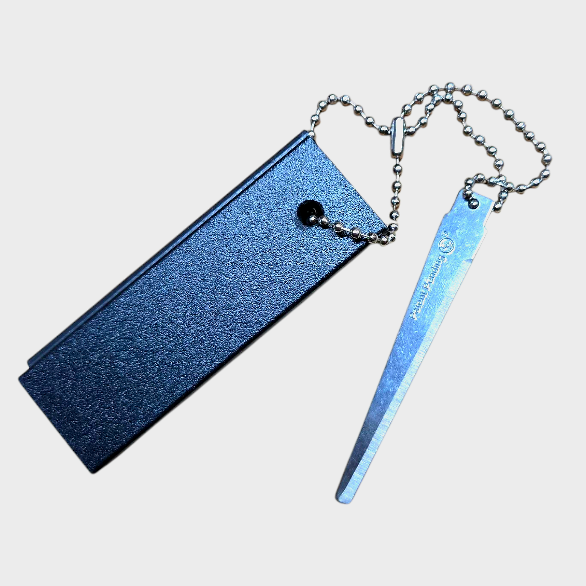 Onethiefsurplus magnesium fire starter for camping and hiking, compact tool with flint and striker for easy fire lighting.