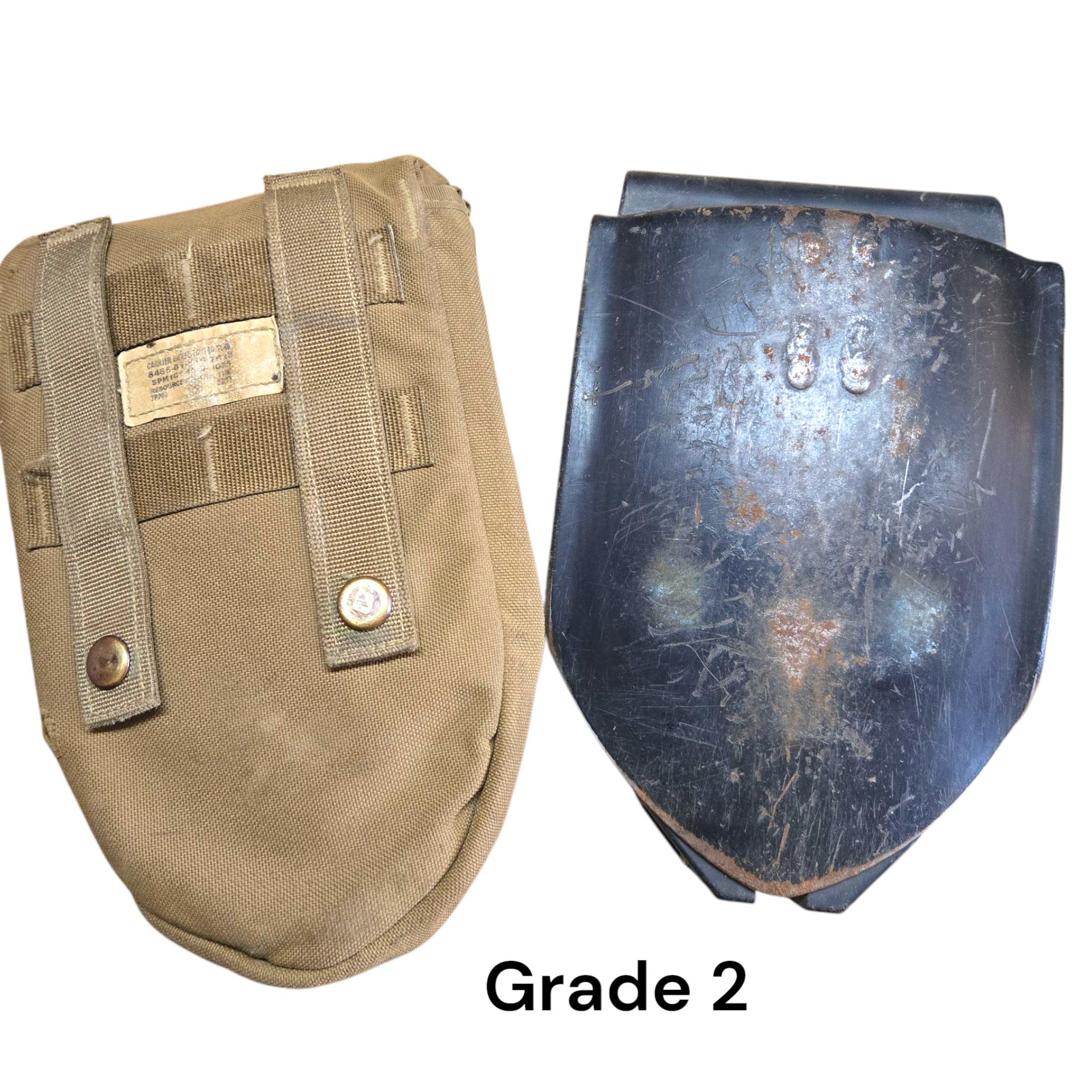 USMC Gerber 2000 entrenching tool for camping and hiking, shown in a compact, sturdy metal design with handle and folding blade.