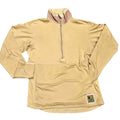 A beige ribbed long-sleeve quarter-zip pullover with a mock neck, laid flat on a white background. It features a small brand patch on the lower right hem.