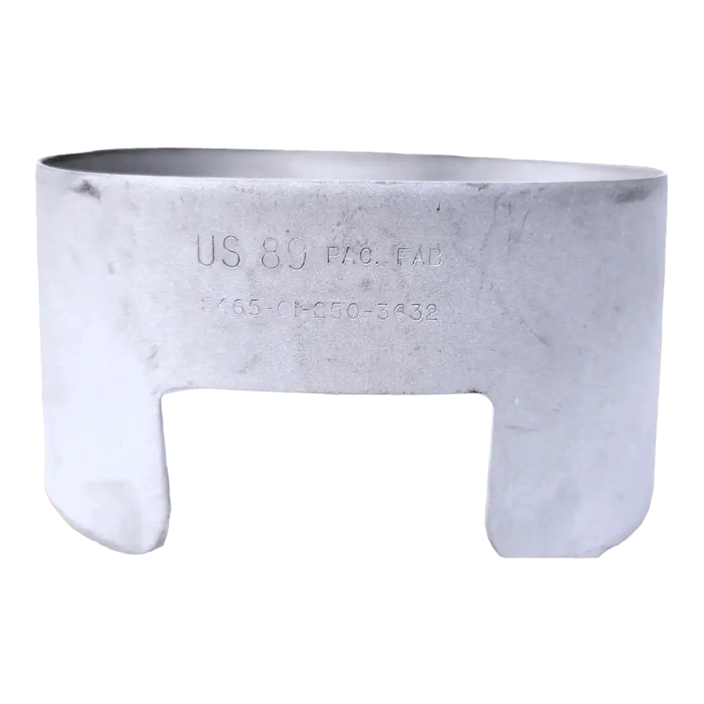 Onethiefsurplus Canteen Cup Stove showing a compact metal stove next to a military-style canteen cup.